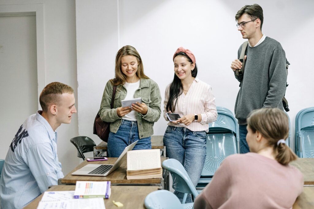 Sales and marketing students in a huddle
